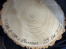 Load image into Gallery viewer, Personalized log Slice Cake Stand, Engraved Rustic wooden Wedding Display stand, Personalised Engraved log Slice, Engagement Dessert Board