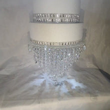 Load and play video in Gallery viewer, Chandelier cake stand [ crystal cake stand [ wedding cake stand + LED lights by Crystal wedding uk