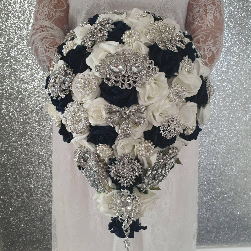 Navy brooch bouquet with artifical foam roses by Crystal wedding uk