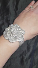 Load and play video in Gallery viewer, Crystal Rose Wedding Cuff Bracelet – Rhinestone Bridal Wrist Corsage, Sparkly Bridesmaid Cuff, Luxury Wedding Jewellery Gift
