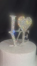 Load and play video in Gallery viewer, Swarovski Crystal LOVE Cake Topper, 6" Diamante Rhinestone Bling Engagement wedding cake topper
