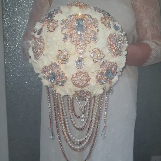 Rose gold Brooch and Pearl drape bouquet by Crystal wedding uk