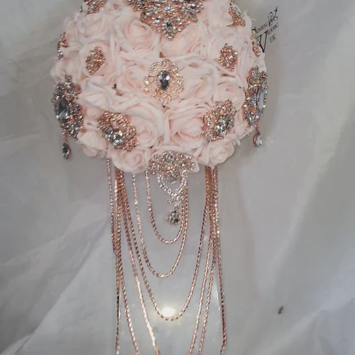 Crystal Brooch blush and rose gold drape  bouquet by Crystal wedding uk