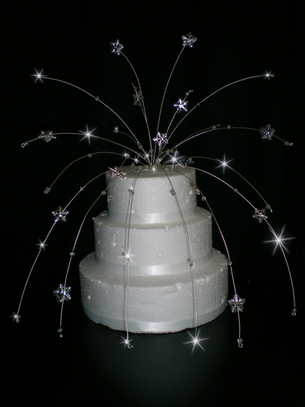 Snowflake Cascade  Cake  topper  for a Winter wedding by Crystal wedding uk
