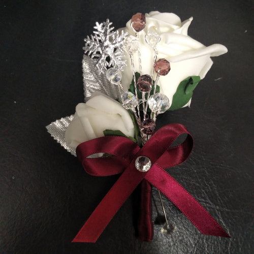Snowflake buttonhole for a Winter wedding by Crystal wedding uk