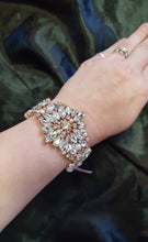 Load image into Gallery viewer, Rose gold crystal Flower wrist corsage, Wedding cuff, BRIDAL WRISTLET
